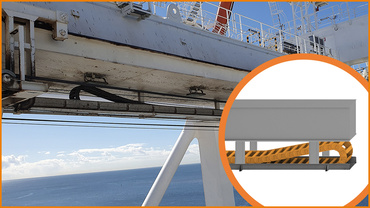 クレーンガーダの下にエナジーチェーンを設置